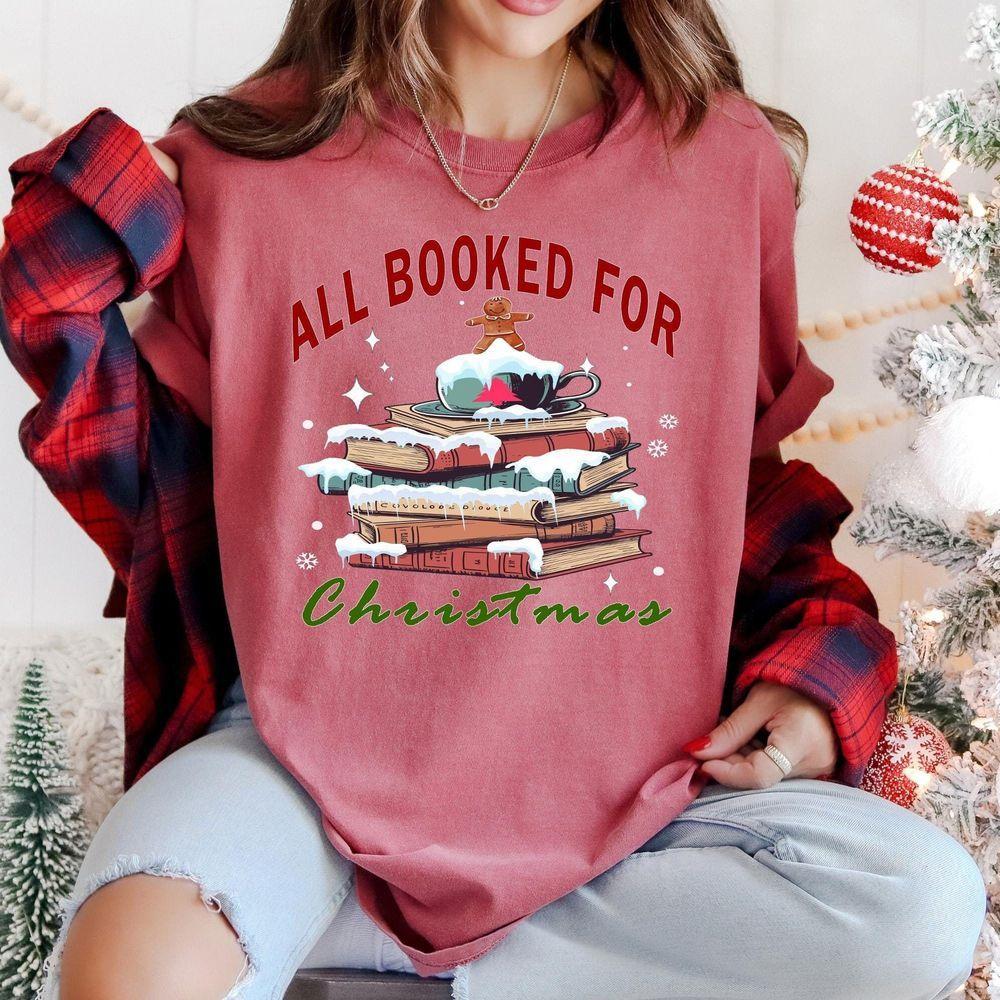 All Booked For Christmas Comfort Colors Shirt Vintage Christmas Tshirt Holiday Bookish Shirt Cozy Holiday Tee Christmas Santa Design Design T-shirt